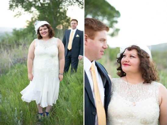 Bride and groom smiling in the meadow on their wedding day