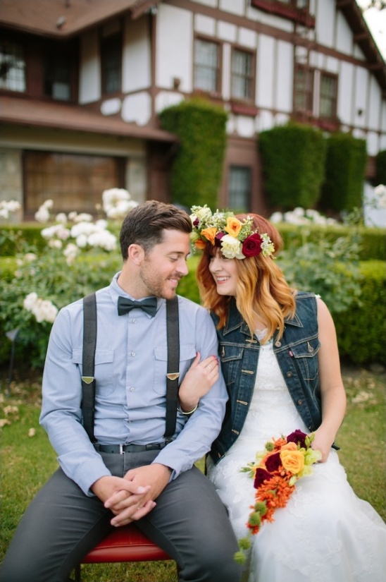 Elegant wedding couple at outdoor ceremony with flower crown
