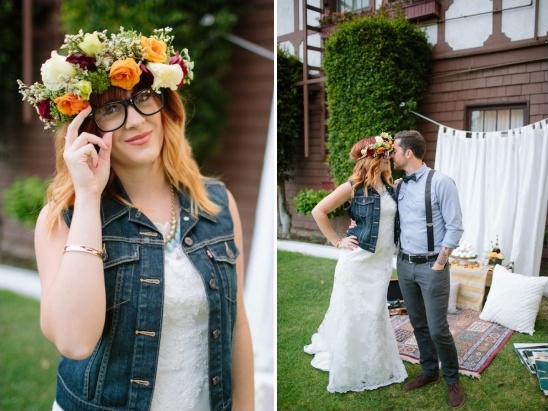 Bride with flower crown in jean vest and groom kissing