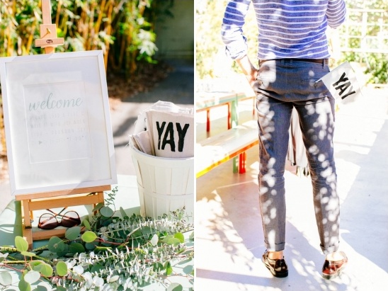 Wedding welcome sign with eucalyptus and Yay flag