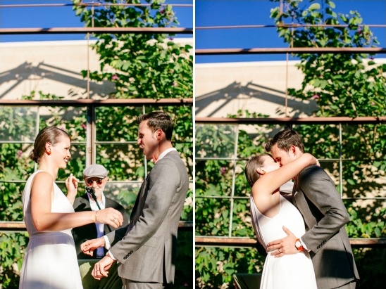 Couple celebrating their wedding day with a kiss