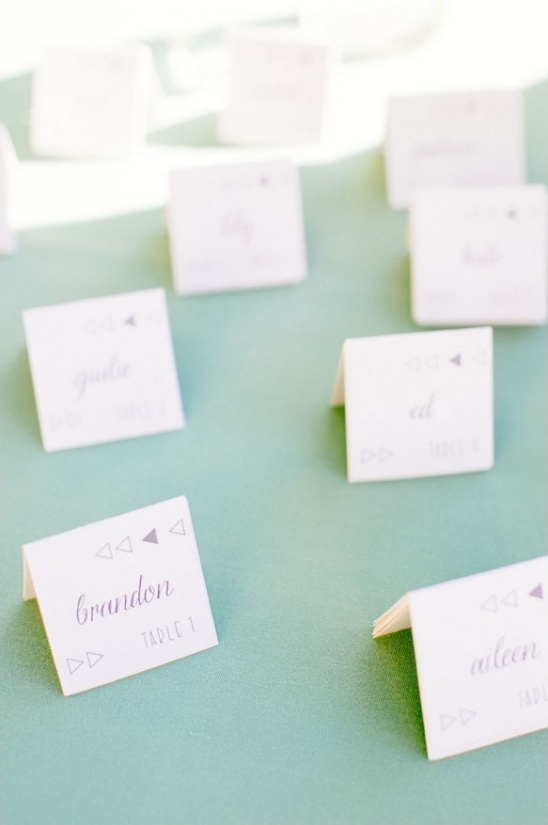 Elegant wedding place cards with names and table numbers