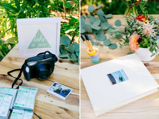 Wedding polaroid camera station with guestbook and floral decor