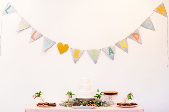 Party banner with cake and sweets on a table