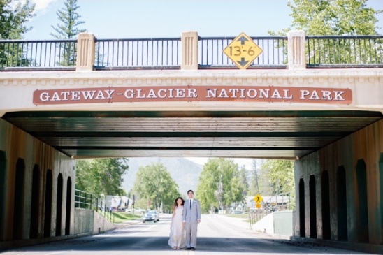 Bride and groom at Glacier National Park entrance