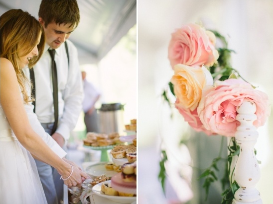Bride and groom at wedding dessert table