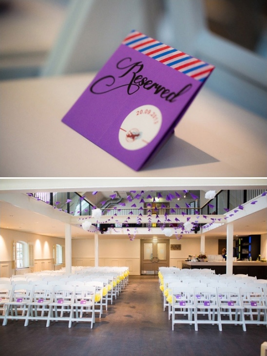 Wedding ceremony venue with reserved sign and decorated chairs