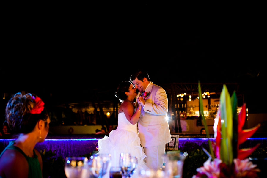 Bride and groom share a tender moment on their wedding day