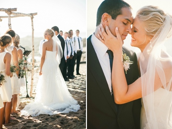 Elegant beach wedding with a bride and groom embracing in love