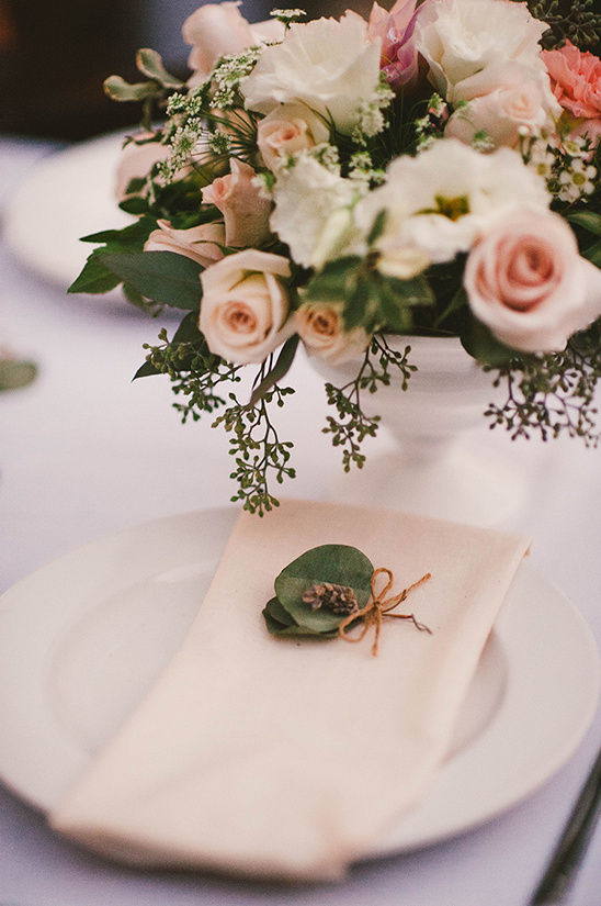 Elegant floral arrangement and napkin on a table setting