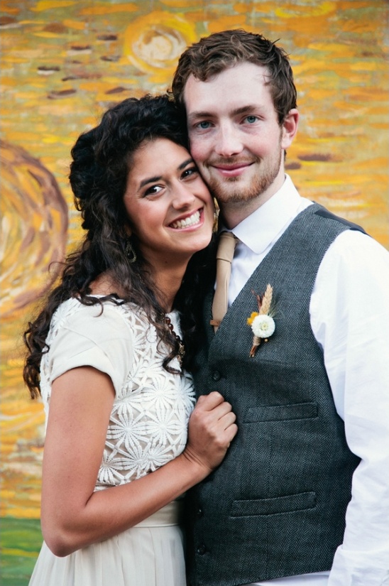 Happy couple embracing at their wedding celebration