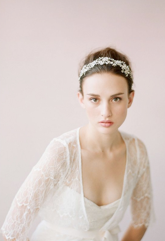 Elegant bride with a crystal headpiece and delicate lace details