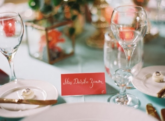 Elegant place setting with wine glasses and Mrs Deirdre Zimon place card