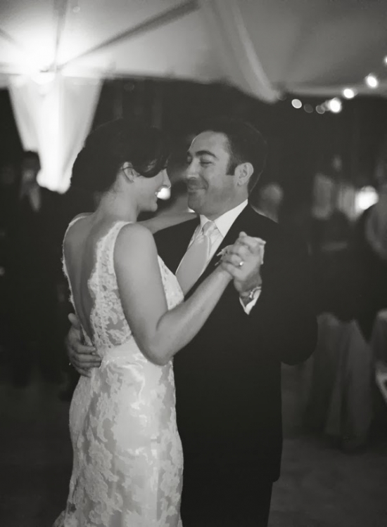 Bride and groom share a loving first dance at their wedding