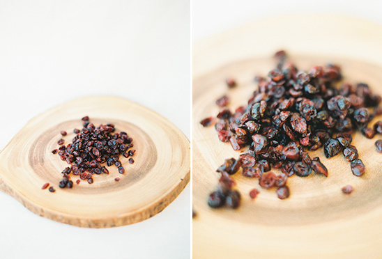 Dried cranberries on wooden board