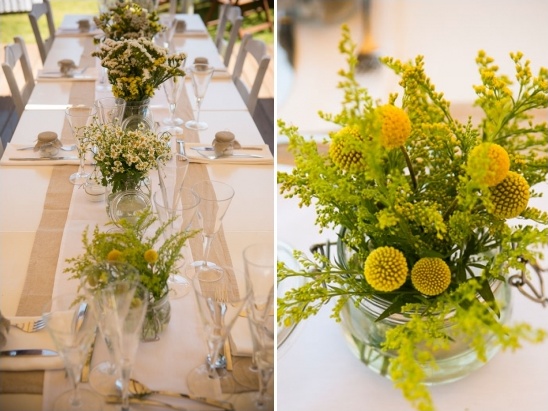 Wedding table decor with yellow Billy Button flower arrangements
