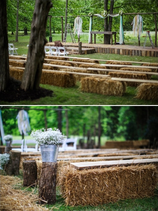 hay bales and boards as seating for backyard wedding ceremony