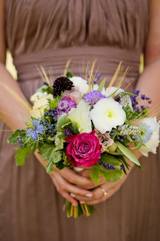 Beautiful rustic wedding bouquet with vibrant flowers