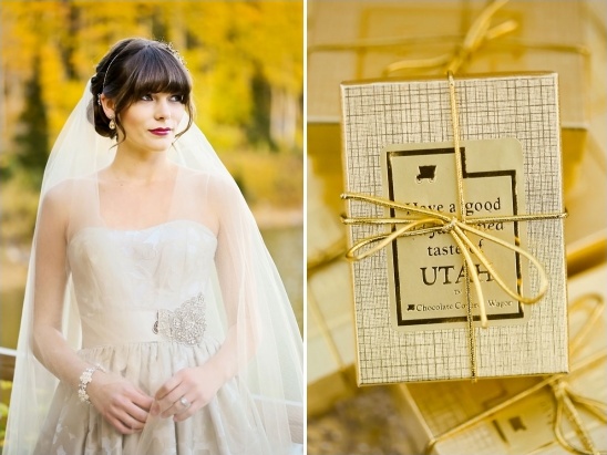 Bride in elegant wedding dress with gold chocolate favors