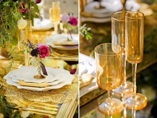 Gold tableware and amber glasses with flowers