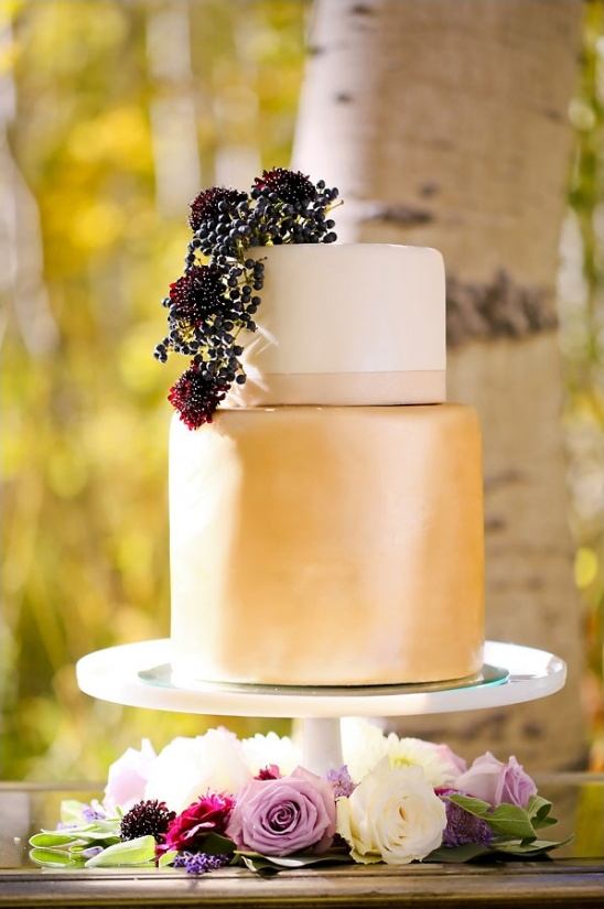 Two tiered wedding cake with floral decor