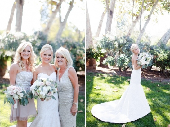 Bride with mother and bridesmaid holding bouquets