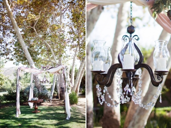 Outdoor wedding altar with chandelier details
