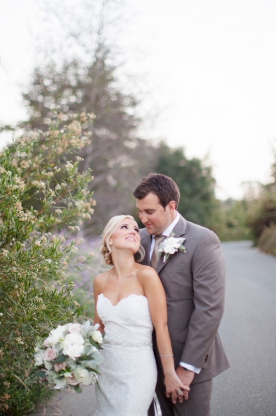 Bride and Groom share loving glance on their wedding day