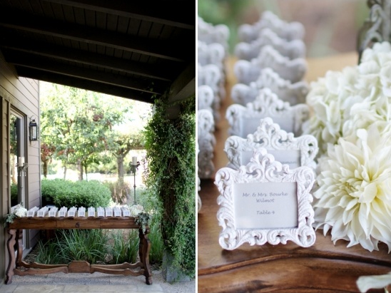 Outdoor wedding place cards with ornate frames and flowers