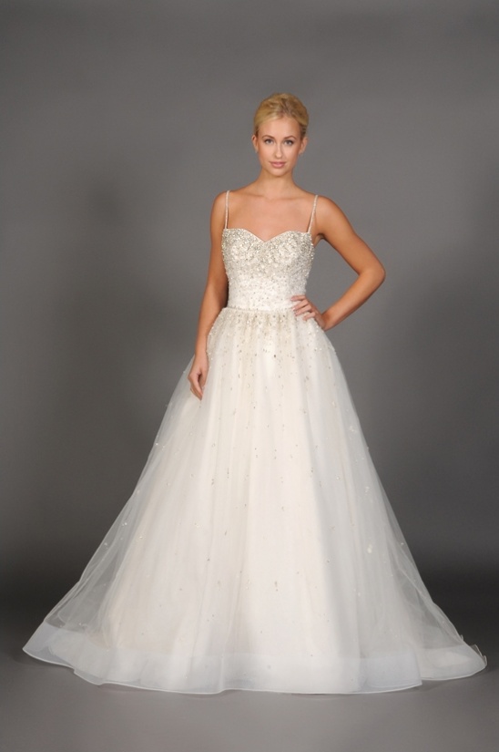 Beaded tulle wedding gown model posing