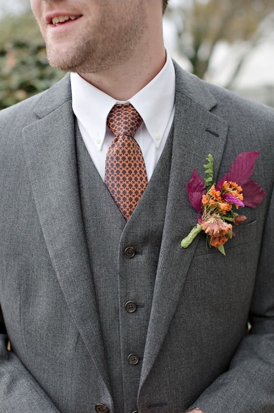 three piece grey suit and patterned tie