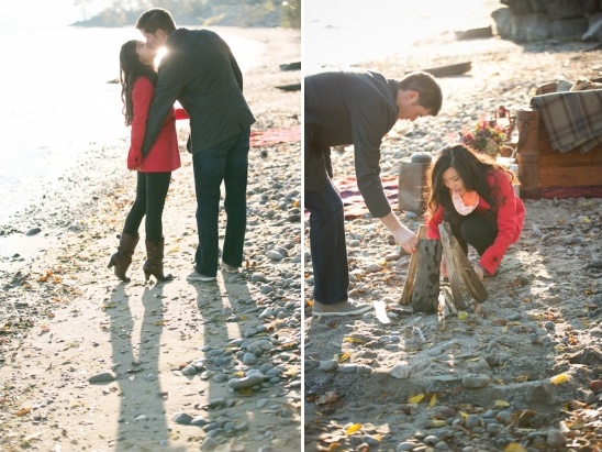 Romantic couple kissing and building a bonfire on the beach