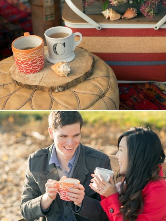 Cozy outdoor picnic with couple enjoying hot drinks