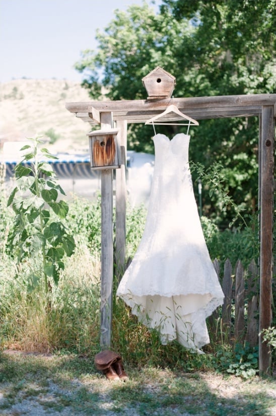 lace wedding gown with cowgirl boots
