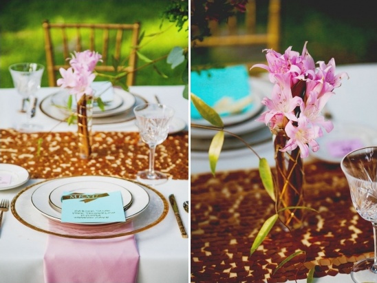 Elegant outdoor wedding table setting with pink accents