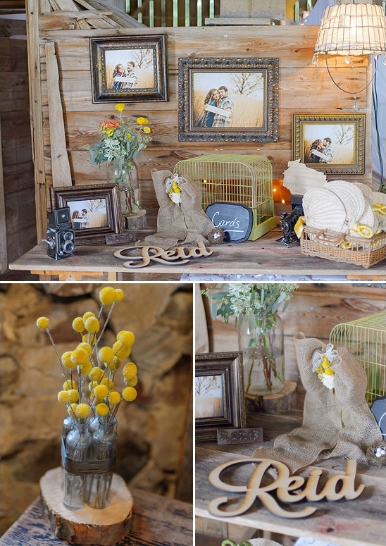 Rustic wedding reception decor with photos and flowers
