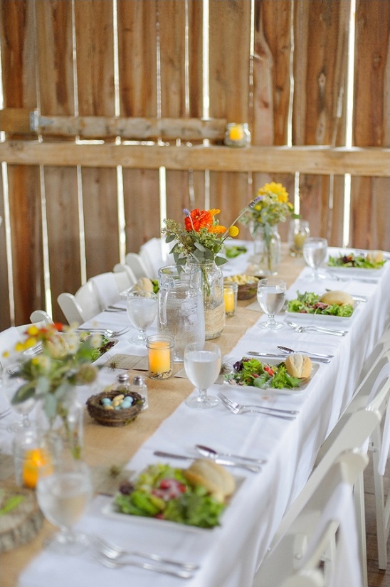 Rustic barn wedding reception table setting