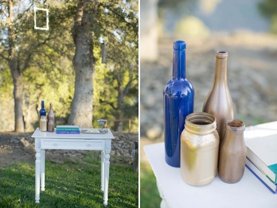 Outdoor table decor with vintage bottles and books