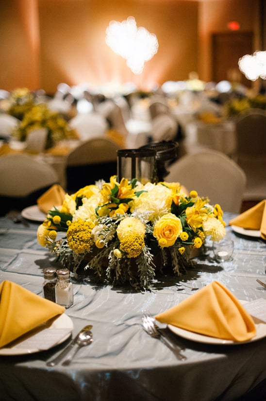 yellow and navy floral centerpieces