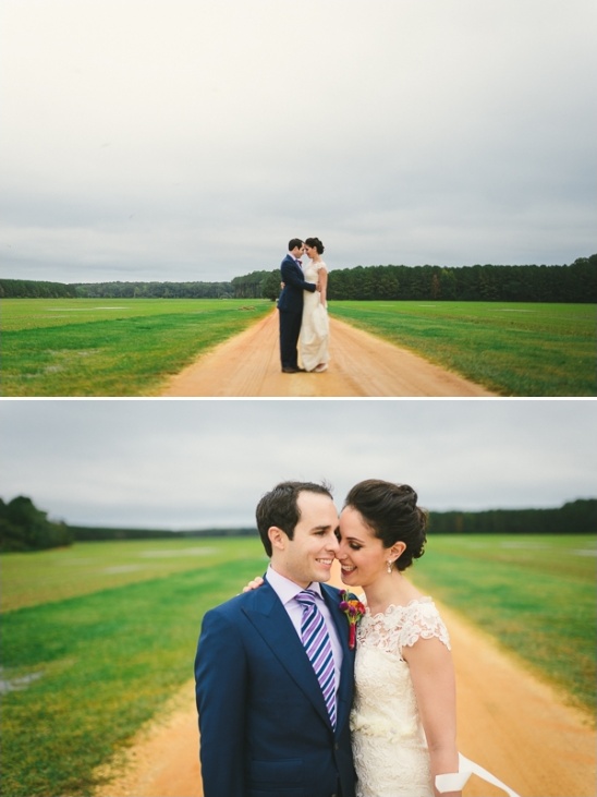Happy couple embracing on rural road wedding photo