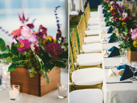 Wedding reception table with colorful floral centerpieces