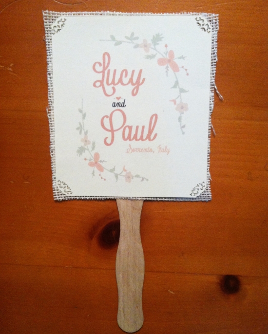 Rustic floral wedding program fans with ivory burlap