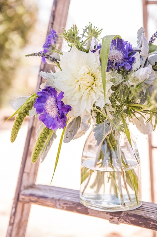 Beautiful purple and white flower bouquet in a glass vase