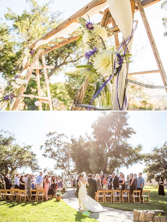 Rustic wedding ceremony with floral arch