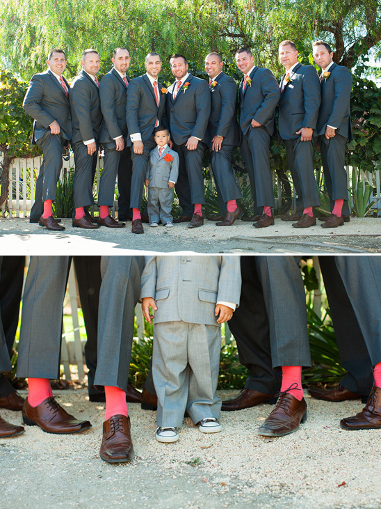 dark gray suits with red socks