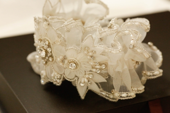 Delicate beaded bridal garter with floral details