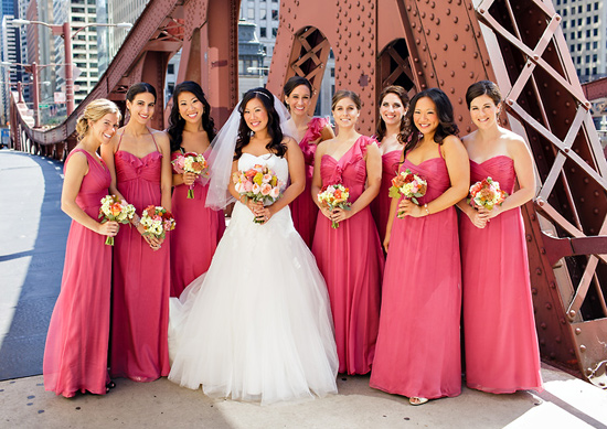 Bride and bridesmaids in pink dresses