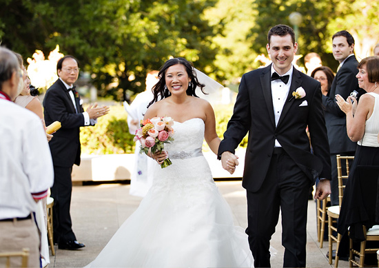 Happy bride and groom at their outdoor wedding ceremony