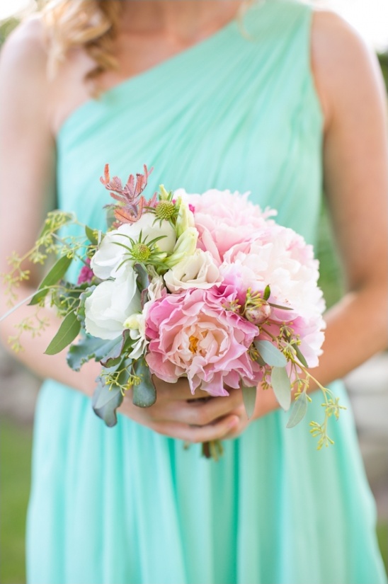 teal bridesmaid dress and pink and white bouquet