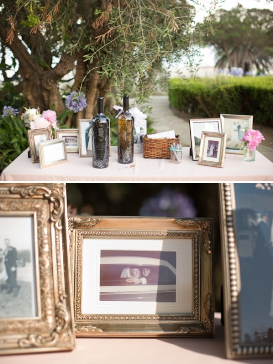 welcome table with framed family photos